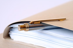 decorative - file folder with pen clipped to it